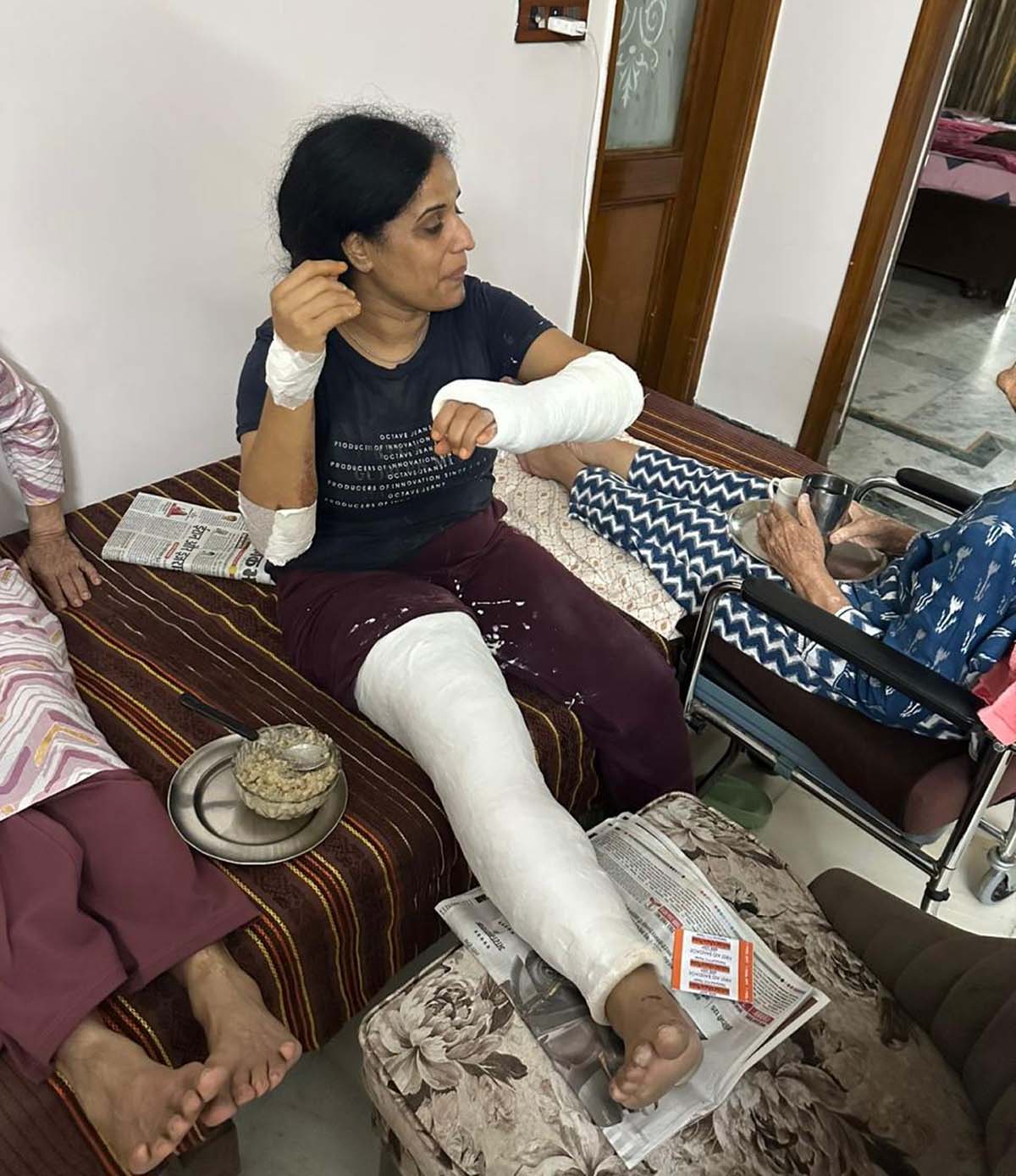 Woman injured after her scooty slipped on the main road left after being scrapped by the Municipal Corporation contractor.